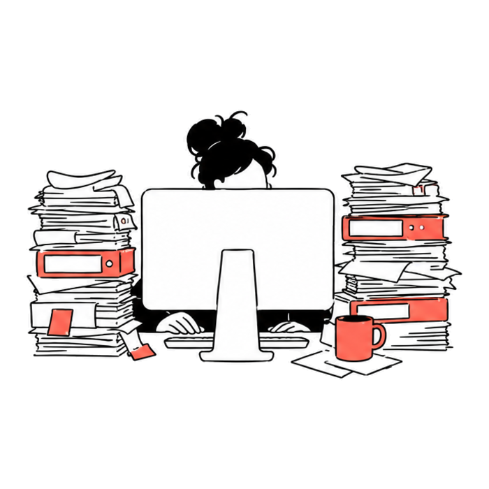 A person disappearing behind stacks of work